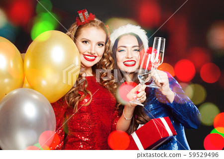 Happy Christmas women on abstract bokeh glitter Happy Christmas women on abstract bokeh glitter 59529496