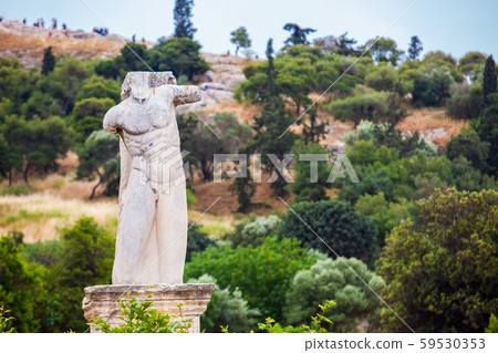 Remains of an antique statue at the ruins of the a Ancient Agora in Athens Remains of an antique statue at the ruins of the a Ancient Agora in Athens 59530353