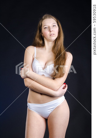 Sexy girl in lingerie on black background studio 59530918