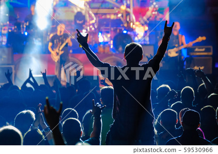 Fans at live rock music concert cheering Fans at live rock music concert cheering 59530966