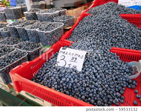 Blue berries (Cyanococcus) sold in the Riga Central Market in Latvian summer Blue berries (Cyanococcus) sold in the Riga Central Market in Latvian summer 59533132