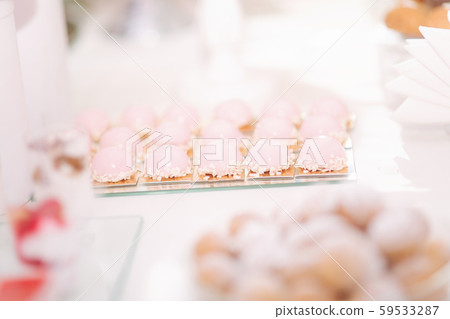 Sweet desert on the table. Different desserts on candy bar 59533287