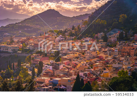 A panoramic view of Taormina, Giardini Naxos and A panoramic view of Taormina, Giardini Naxos and 59534033