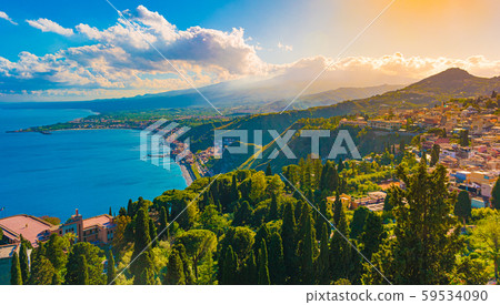 A panoramic view of Taormina, Giardini Naxos and 59534090