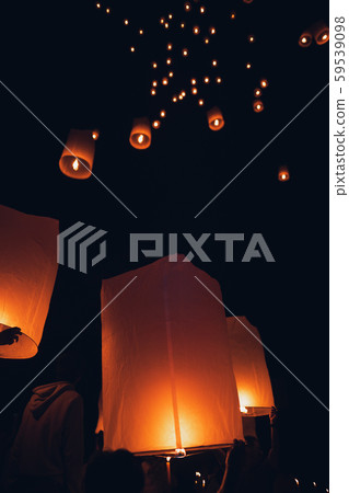Lighting candles, lanterns in the sky at night in 59539098