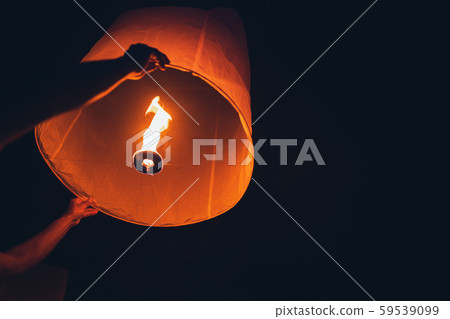 Lighting candles, lanterns in the sky at night in 59539099