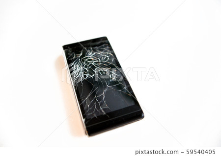 Broken phone glass. broken black smartphone. Close up on white background Broken phone glass. broken black smartphone. Close up on white background 59540405