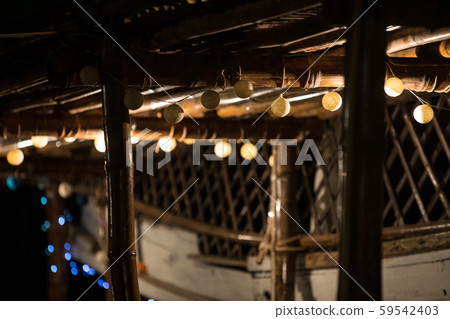 Asian night bar on the beach with festive decoration Asian night bar on the beach with festive decoration 59542403
