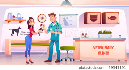 Young woman giving cat to veterinarian doctor 59545191