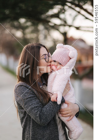 Young mother with her little baby. Mom hold baby on hands. Happy family Young mother with her little baby. Mom hold baby on hands. Happy family 59546555