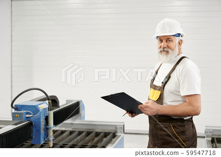 Eder engineer looking at camera and posing Eder engineer looking at camera and posing 59547718
