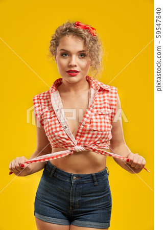 Sexy stylish girl in checkered shirt with penetrating look Sexy stylish girl in checkered shirt with penetrating look 59547840