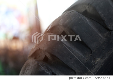 Wheel of a large lorry is standing outside Wheel of a large lorry is standing outside 59548464