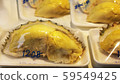 Processed and packaged durian fruit in polystyrene foam containers and plastic wrappings 59549425