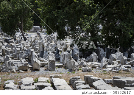 The ruins of the ancient antique city of Ephesus the library building of Celsus, the amphitheater temples and columns. Candidate for the UNESCO World Heritage List  59552617