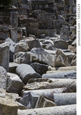 The ruins of the ancient antique city of Ephesus the library building of Celsus, the amphitheater temples and columns. Candidate for the UNESCO World Heritage List The ruins of the ancient antique city of Ephesus the library building of Celsus, the amphitheater temples and columns. Candidate for the UNESCO World Heritage List 59552624