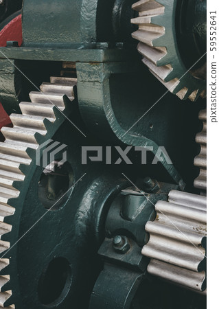 Big steel gear shot close-up photo. Big steel gear shot close-up photo. 59552641