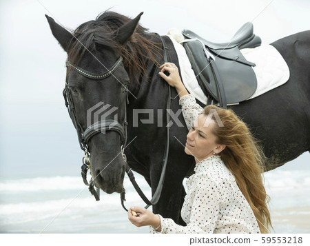 riding girl and horse riding girl and horse 59553218