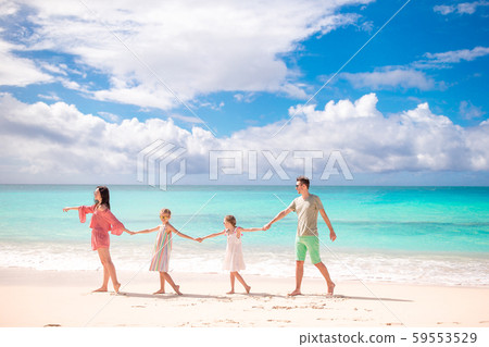 Young family on vacation on the beach. Family travel concept 59553529