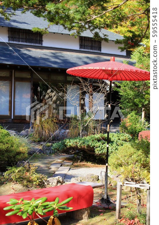 Umbrellas at a teahouse in the garden of a Japanese house Umbrellas at a teahouse in the garden of a Japanese house 59555418