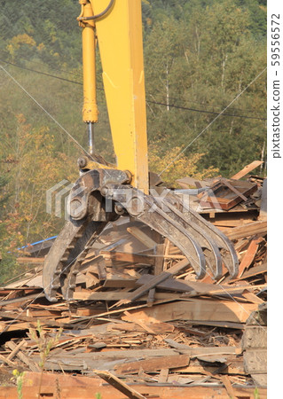 Demolition work site of a mountain house Demolition work site of a mountain house 59556572