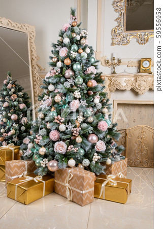 Christmas tree with pink pines and multicolored balls Christmas tree with pink pines and multicolored balls 59556958