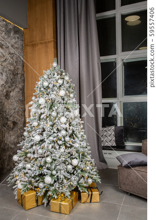 New Year silver tree with white toys and gold gifts 59557406