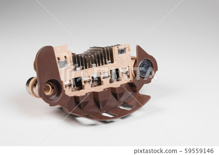 Close-up of a new relay regulator equalizing the voltage in the generator. New auto parts 59559146