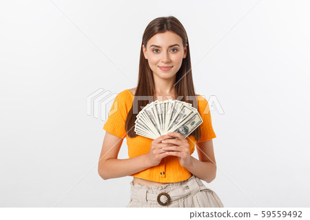 young business woman holding money isolated on white background. young business woman holding money isolated on white background. 59559492