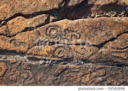 Rock paintings of ancient civilizations. Made by the aborigines of Central America by the Taino Rock paintings of ancient civilizations. Made by the aborigines of Central America by the Taino 59560696