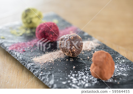 Candy chocolate truffle. Breakfast in the cafe, morning coffee. on wooden table. Restaurant menu Candy chocolate truffle. Breakfast in the cafe, morning coffee. on wooden table. Restaurant menu 59564455