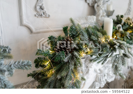 Closeup of Christmas tree branches with decorative balls, ribbon bows, snowflakes, pine cones and Closeup of Christmas tree branches with decorative balls, ribbon bows, snowflakes, pine cones and 59564522