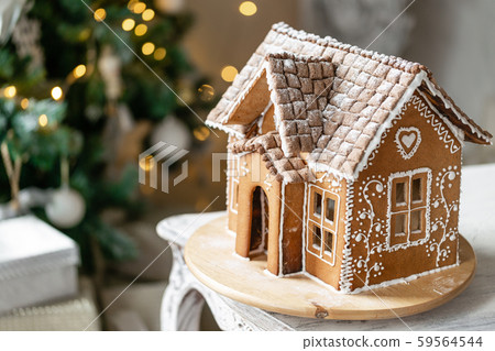 Gingerbread house, concept holiday of Christmas and Happy new year. Defocused lights of Christmas 59564544