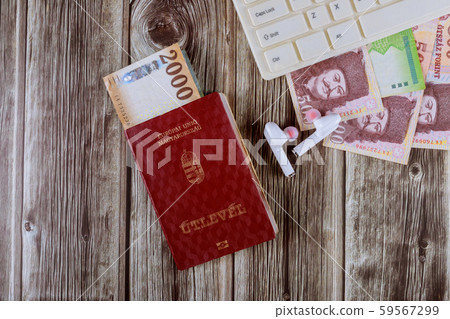 Magyar passport and computer keyboard with forint Magyar passport and computer keyboard with forint 59567299