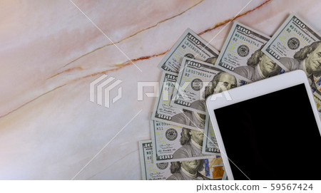 Digital tablet with screen in over cash money Digital tablet with screen in over cash money 59567424