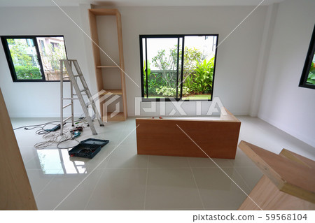 interior home office renovation, furniture built in with plywood material installing in a new house interior home office renovation, furniture built in with plywood material installing in a new house 59568104