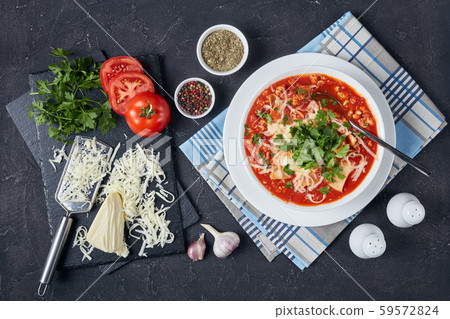 close-up of chicken lasagna soup in bowl close-up of chicken lasagna soup in bowl 59572824
