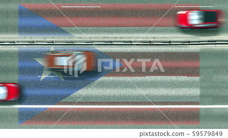 Aerial top down view of cars and flag of Puerto Rico on the road. Traveling related conceptual 3D Aerial top down view of cars and flag of Puerto Rico on the road. Traveling related conceptual 3D 59579849