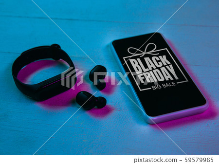 Top view of set of gadgets in purple neon light Top view of set of gadgets in purple neon light 59579985