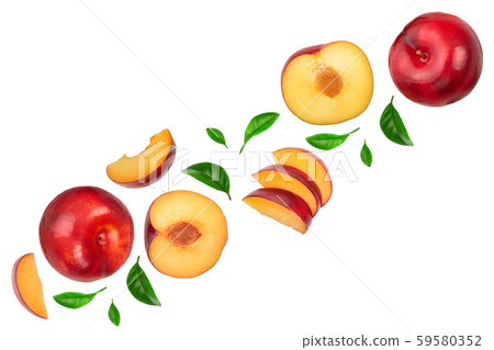 fresh red plum and half with leaves isolated on white background with copy space for your text. Top 59580352