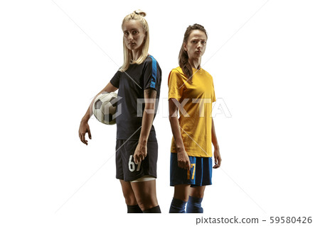 Female soccer players practicing and training at the stadium 59580426