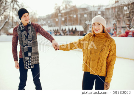 Cute couple in a ice arena 59583063