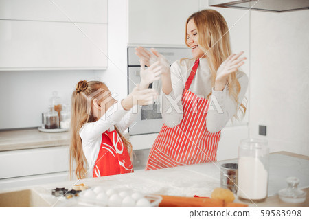 Family cook the dough for cookies 59583998
