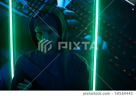 Computer hacker typing a password 59584443