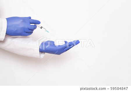 Doctor cosmetologist injecting Botox into an egg is a concept of injections for rejuvenating and 59584847