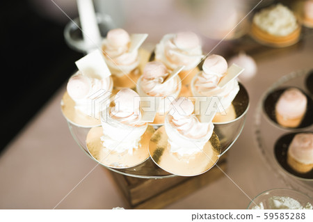 Delicious wedding reception candy bar dessert table Delicious wedding reception candy bar dessert table 59585288
