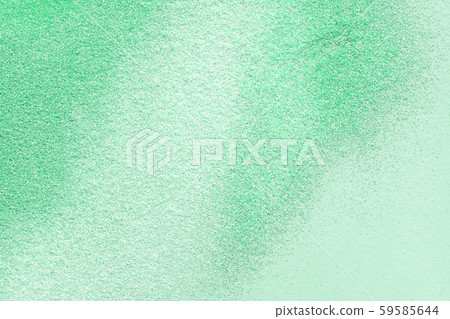 Many multi-colored spangles are scattered on a mint background. Many multi-colored spangles are scattered on a mint background. 59585644