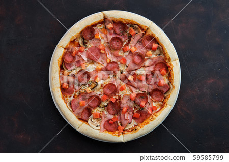 Top view of pizza with ham, bacon, sausage, tomato Top view of pizza with ham, bacon, sausage, tomato 59585799