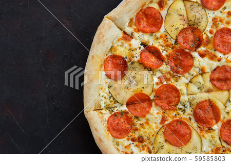 Close up view of pizza with sausage, pear and dor Close up view of pizza with sausage, pear and dor 59585803