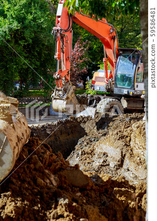 Outdoor work : Excavator digging to moving the 59586481